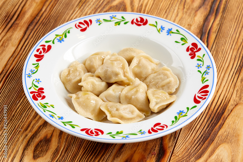 dumplings with meat on the wooden table