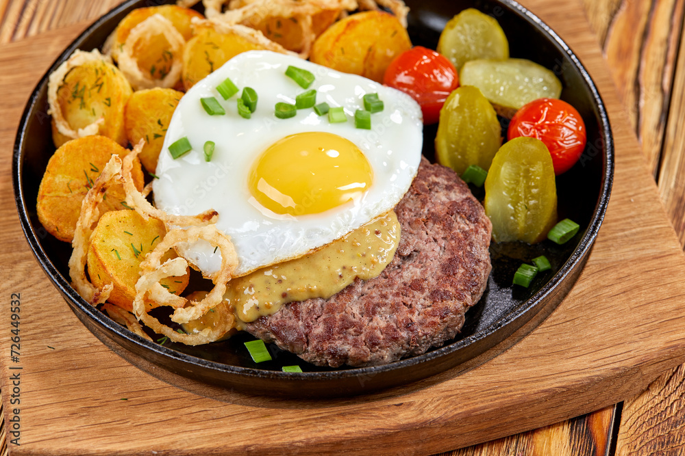 baked potatoes with cultet and fried egg baked potatoes with cultet and fried egg