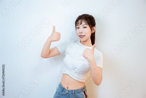 A girl in short sleeved shorts indoors