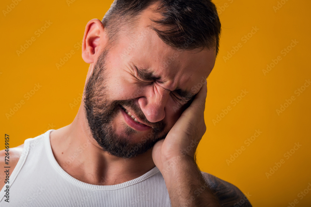 Obraz premium Man suffering from ear pain. Hand on ear. People, healthcare and medicine concept