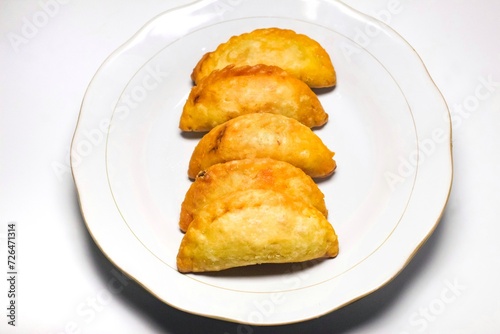 Fried empanadas on a plate