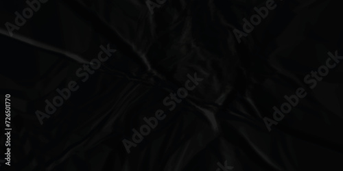 Black paper texture is crumpled paper texture. Black crumpled and creased paper texture. Black crumpled blank paper texture. Grunge paper texture.