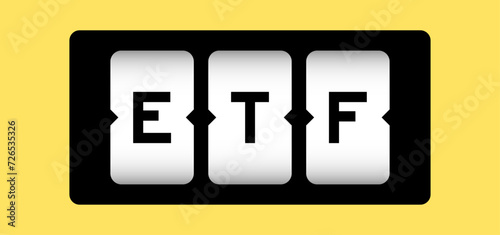 Black color in word ETF (abbreviation of Exchange Traded Fund) on slot banner with yellow color background