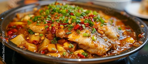 Famous Chinese dish, spicy fish boiled with pickled cabbage in Sichuan style.
