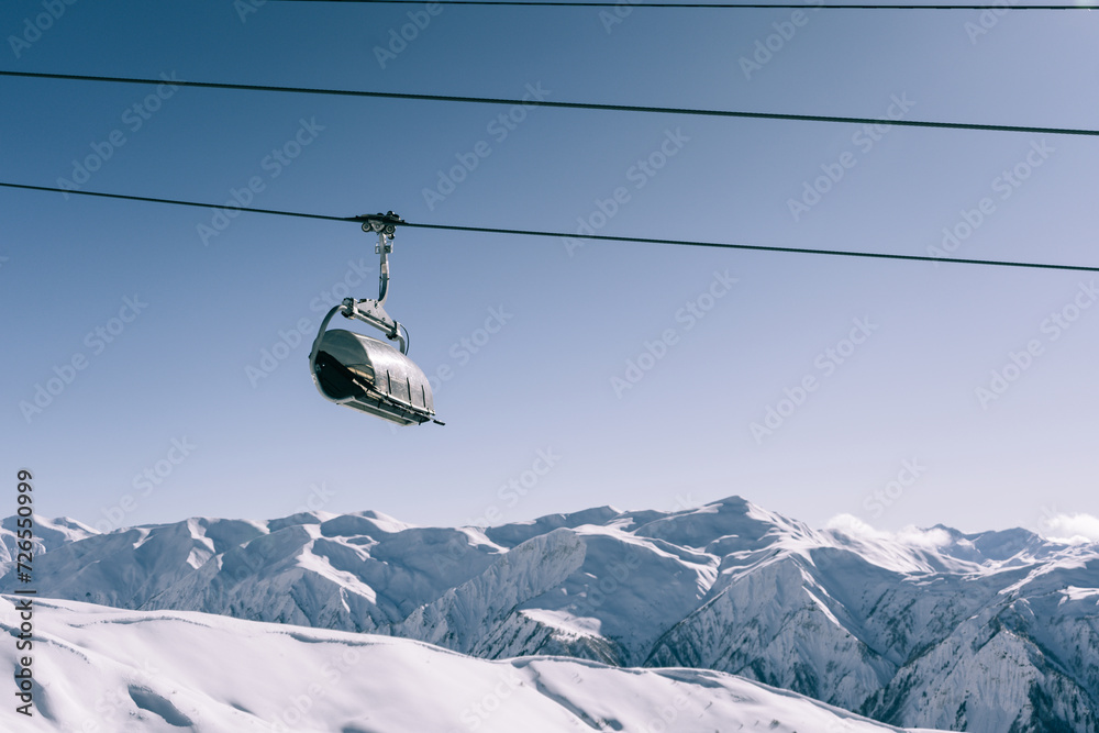 Ski lift at ski resort in  high mountains
