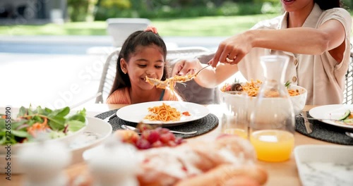 Happy, pasta and child with mother at lunch for family bonding, food and health. Nutrition, relax and hungry with people eating in dining room at home for love, care and holiday event together photo