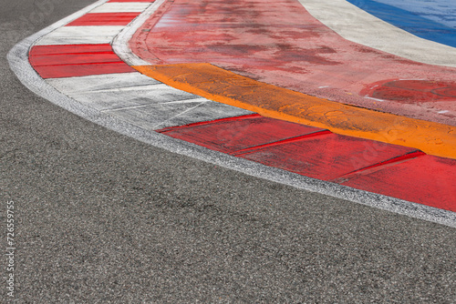 Close-up of tire tracks on a paved asphalt road, race track texture and background, abstract background black tire track. Skid marks on an asphalt road