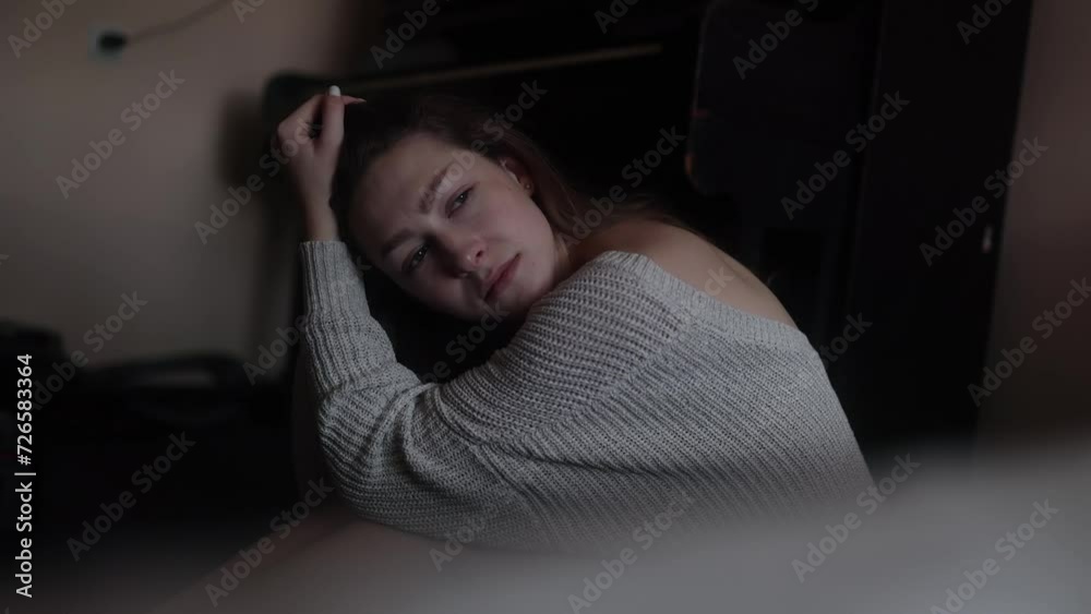 Portrait of sad young woman suffering from depression anxiety loneliness or mental health problem at home brunette Female upset feeling stress and pressure indoors Portrait of sad young woman suffering from depression anxiety loneliness or mental health problem at home brunette Female upset feeling stress and pressure indoors
