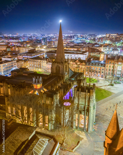 Sheffield, Yorkshire. United Kingdom. 01.26.2024 Sheffield Cathedral and City Centre under a Full Moon at nightfall. Aerial Image. 26th January 2024.