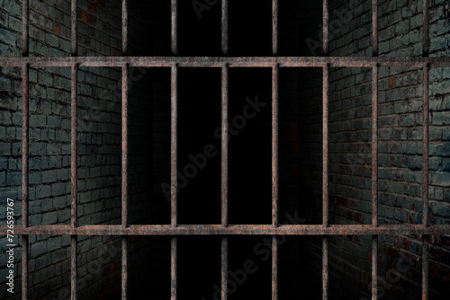 Dark and dim space in an empty prison cell with old brick walls. and old rusted iron bars, The concept of fear and lack of freedom