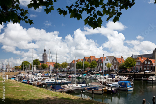 Overzicht van de jachthaven van Veere in Zeeland met op de achtergrond de kerktoren photo