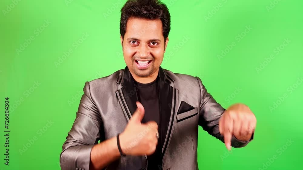 smiling young man showing do like and subscribe comment below gesturing for you tube video smiling young man showing do like and subscribe comment below gesturing for you tube video