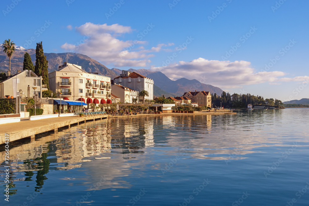 Beautiful Mediterranean landscape. Montenegro, Adriatic Sea. View of embankment of Tivat city  and  Bay of Kotor on sunny autumn day