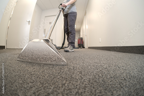 closeup of a pressure jet cleaning a carpet