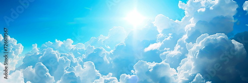 blue sky with fluffy white clouds, environmentally friendly visual effects. photo