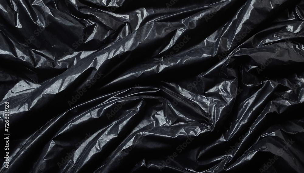 Black plastic bag texture. Dark material background Black plastic bag texture. Dark material background