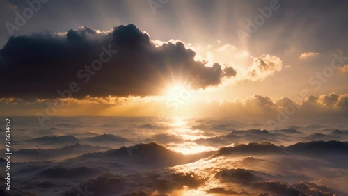 The sun appears from behind a thick layer of clouds creating a dramatic and striking image.