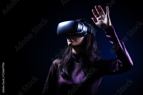 Woman using VR headset reaching out, suitable for tech and gaming designs.