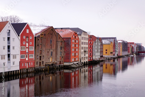 Colorful old houses on the water in Trondheim Norway in winter