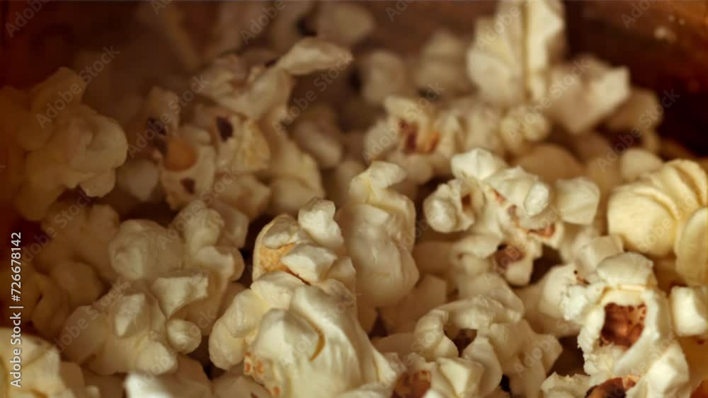 The popcorn inside the paper bag hits the walls. Filmed on a high-speed camera at 1000 fps. High quality FullHD footage The popcorn inside the paper bag hits the walls. Filmed on a high-speed camera at 1000 fps. High quality FullHD footage