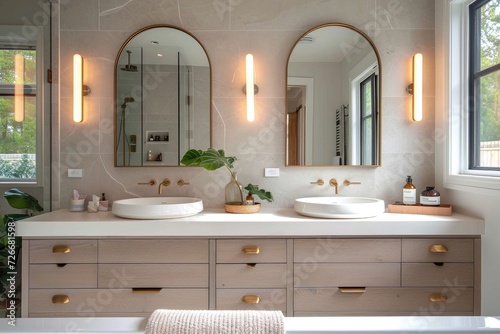 Step into luxury and functionality in this stunning bathroom  complete with sleek double sinks  elegant mirrors  and modern plumbing fixtures against a backdrop of beautifully tiled walls and a windo