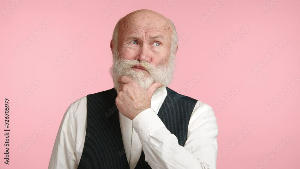 A poised individual in semi-formal attire stands in contemplation, hand on chin, against a pastel pink setting that softens his reflective mood. Camera 8K RAW. A poised individual in semi-formal attire stands in contemplation, hand on chin, against a pastel pink setting that softens his reflective mood. Camera 8K RAW.