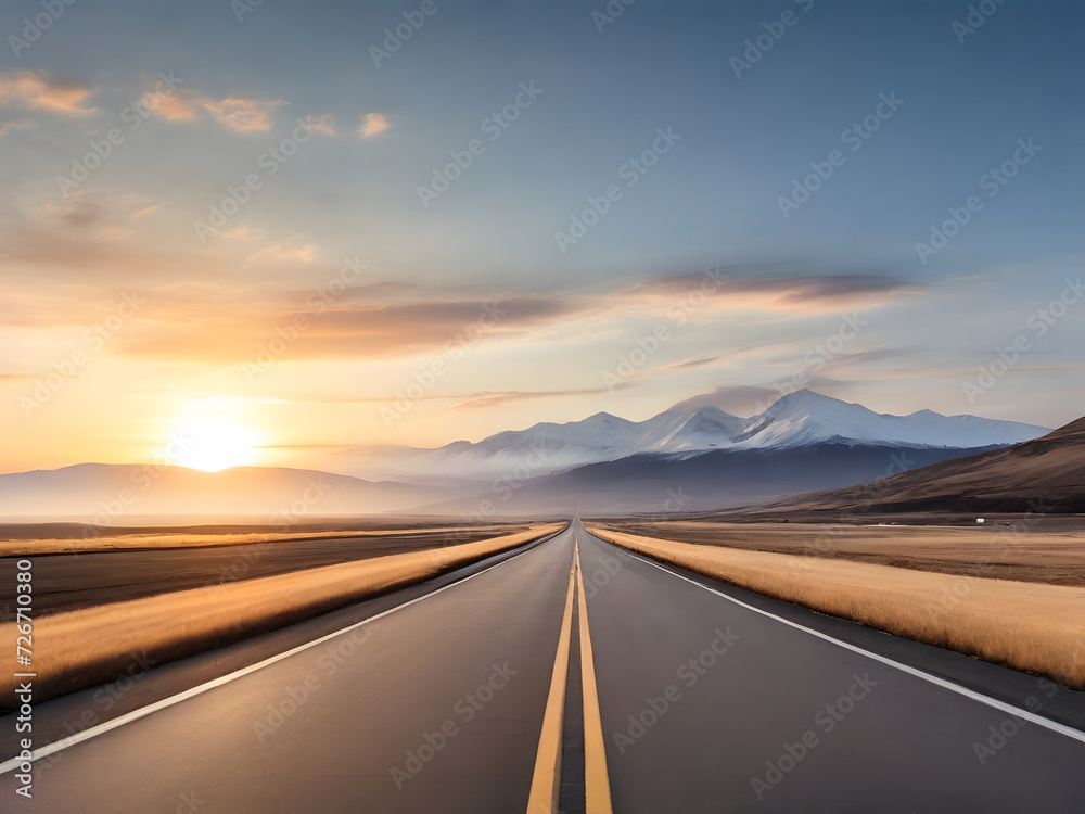 Empty asphalt road and mountain scenery at sunrise