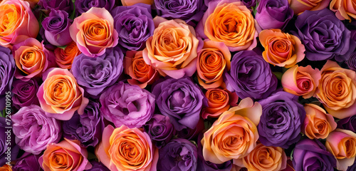 lush bouquet of violet and orange roses in full bloom photo