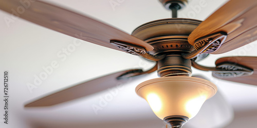 Modern Ceiling Fan in a Cozy Living Room, copy space. Contemporary ceiling fan with light, blending seamlessly into a bright, stylish home interior.