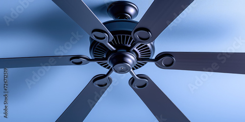 Modern black Ceiling Fan in a Cozy Living Room, copy space. Contemporary ceiling fan with light, blending seamlessly into a bright, stylish home interior.