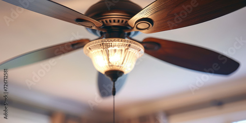 Modern Ceiling Fan in a Cozy Living Room, copy space. Contemporary ceiling fan with light, blending seamlessly into a bright, stylish home interior.