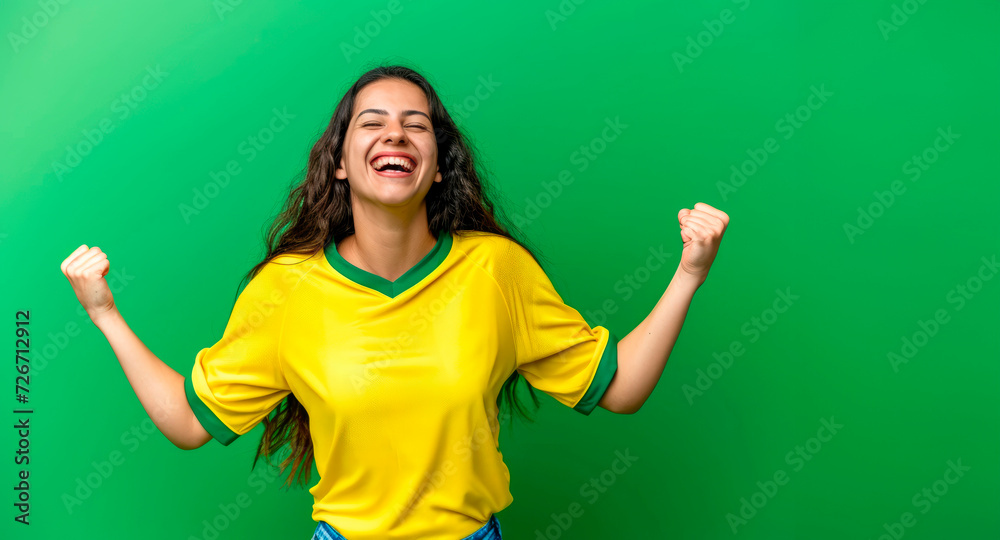 A Happy Young Woman in Yellow and Blue Stands Against a Luminous Green Background - A Radiant Composition of Colors Evoking the Vibrancy of Brazil, Australia and More countries. Ample Copy Space A Happy Young Woman in Yellow and Blue Stands Against a Luminous Green Background - A Radiant Composition of Colors Evoking the Vibrancy of Brazil, Australia and More countries. Ample Copy Space