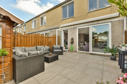 Modern suburban home patio with stylish outdoor setup photo