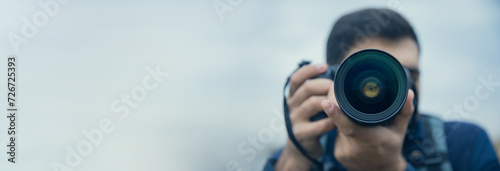 Male photographer hand camera