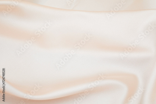 Beige Silk Background. Beautiful gold colour soft silk fabric