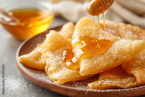 Homemade deep fried sopapillas with honey. Generative AI photo