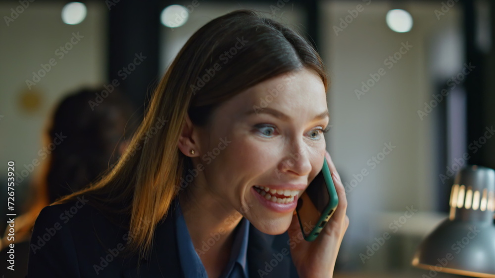 Joyful manager speaking mobile phone closeup. Happy businesswoman enjoy victory Joyful manager speaking mobile phone closeup. Happy businesswoman enjoy victory