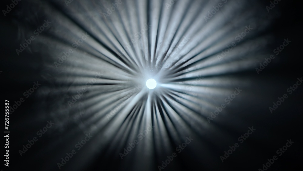 Obraz premium Studio shot of projector haze isolated on black background. White light rays shining around from spotlight, smoke moving up.