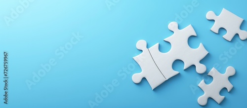 Puzzle jigsaw business symbol of strategy solution isolated on blue background. AI generated image photo