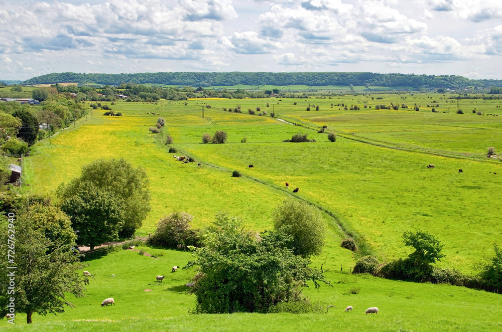 Obraz premium Views from Burrow Mump overlooking the surrounding countryside of Southlake Moor in Burrowbridge Somerset on a sunny day 