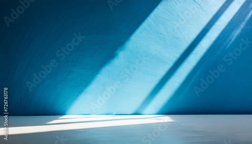 abstract blue background with drop shadow and light backdrop for product presentation