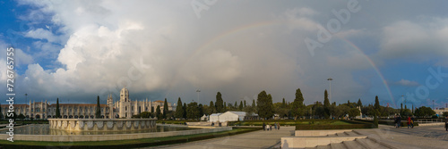 Panorama of the Hieronymites Monastery Mosteiro dos Jeronimos in Belem with rainbow on the sky above, Lisbon, Portugal photo