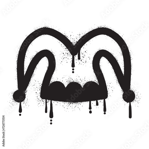 Jester hat graffiti drawn with black spray paint