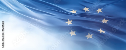 flying and waving fabric in the colors of the European union euro flag as wide graphic abstract banner for political or national government with empty copyspace