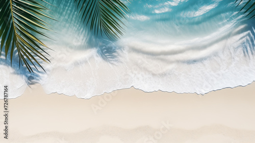 photo top view of water surface with tropical leaf shadow. Shadow of palm leaves on white sand beach 3