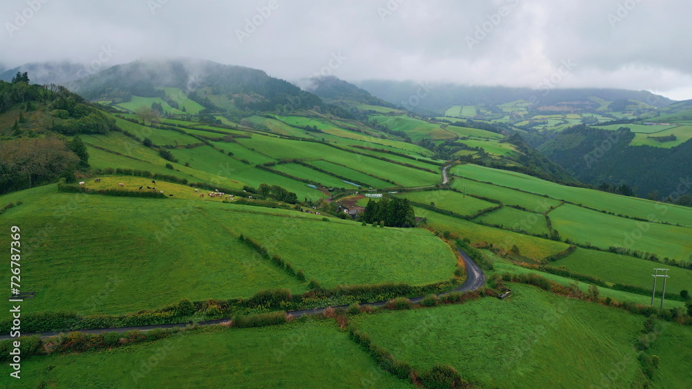 Rainy sky forest nature drone view. Cloudy green hills mist slopes landscape Rainy sky forest nature drone view. Cloudy green hills mist slopes landscape