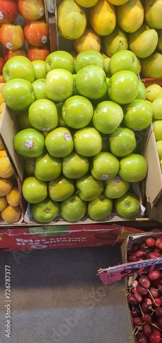 Fototapeta Naklejka Na Ścianę i Meble -  cherries, apples, red, yellow, green, central de abastos, supermarket at cdmx, mexcio