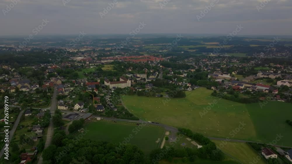 Drone moves forward capturing the tranquil essence of Palau town in Eastern Germany during twilight Drone moves forward capturing the tranquil essence of Palau town in Eastern Germany during twilight