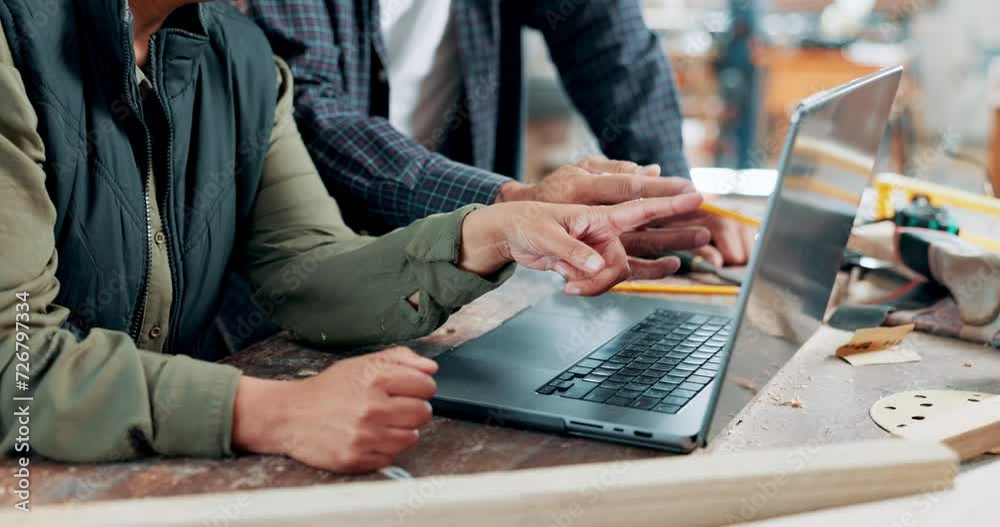 Teamwork, hands and carpenter with laptop in workshop manufacturing or engineering project. People planning, woodwork or workers in warehouse for talking or speaking of building timber production