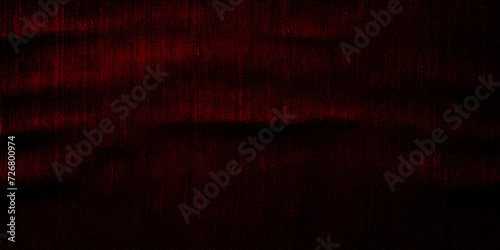 Wide surface of burgundy fabric denim grunge texture. For wallpaper  banner  background design images. Blank copy space Close-up